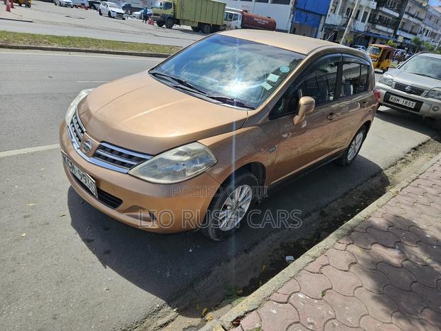 2011 Nissan Tiida Gold - Reliable Sedan with Luxurious Interior