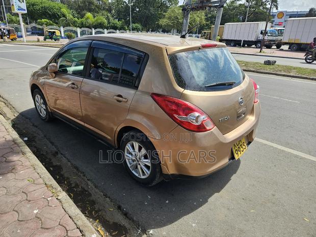 2011 Nissan Tiida Gold - Reliable Sedan with Luxurious Interior