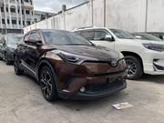 Used Brown Toyota C-HR SUV - Spacious interior, advanced safety features, and stylish looks. Ideal for families or those who love to for sale