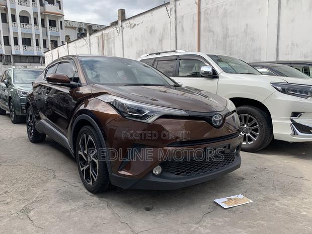 Used Brown Toyota C-HR SUV - Spacious interior, advanced safety features, and stylish looks. Ideal for families or those who love to