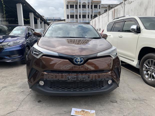 Used Brown Toyota C-HR SUV - Spacious interior, advanced safety features, and stylish looks. Ideal for families or those who love to