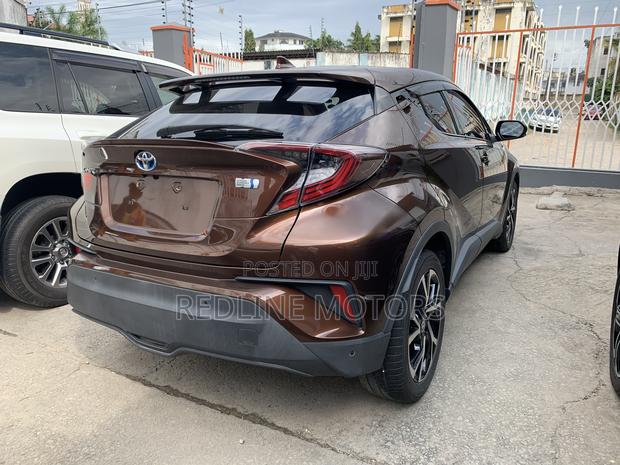 Used Brown Toyota C-HR SUV - Spacious interior, advanced safety features, and stylish looks. Ideal for families or those who love to