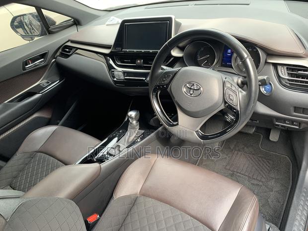 Used Brown Toyota C-HR SUV - Spacious interior, advanced safety features, and stylish looks. Ideal for families or those who love to