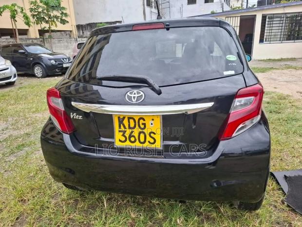 Black 2015 Toyota Vitz: Modern Subcompact Hatchback