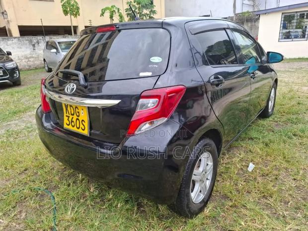 Black 2015 Toyota Vitz: Modern Subcompact Hatchback