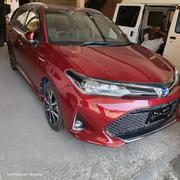 Toyota Corolla Fielder 1.5 Hybrid FWD 2018 Maroon for sale