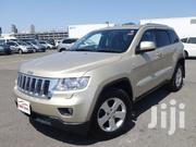 Pre-owned 2012 Jeep Grand Cherokee in Gold: Great Value! for sale