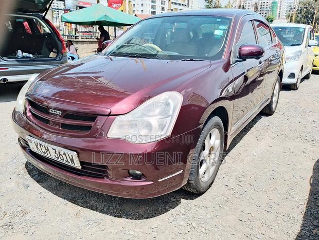 Nissan Bluebird 2010 Maroon