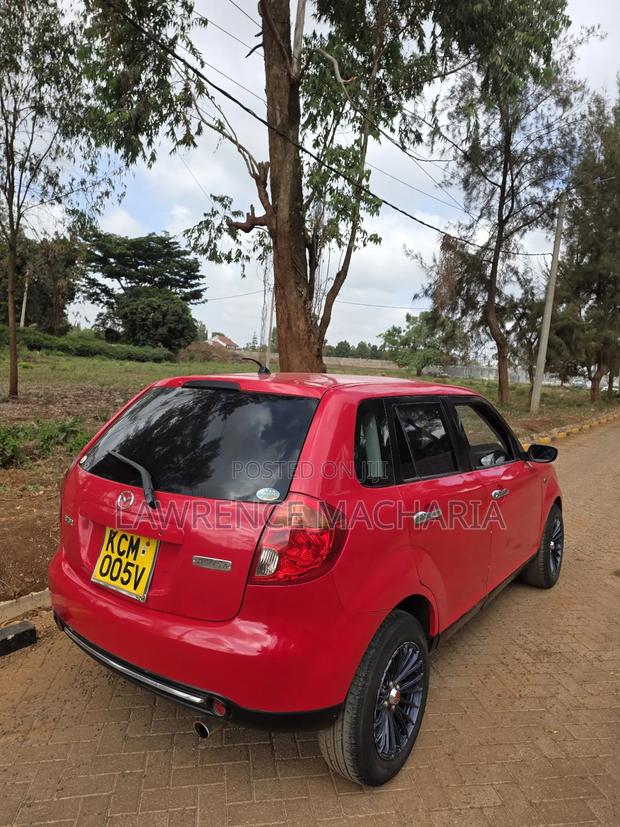 Mazda Verisa 2009 Red