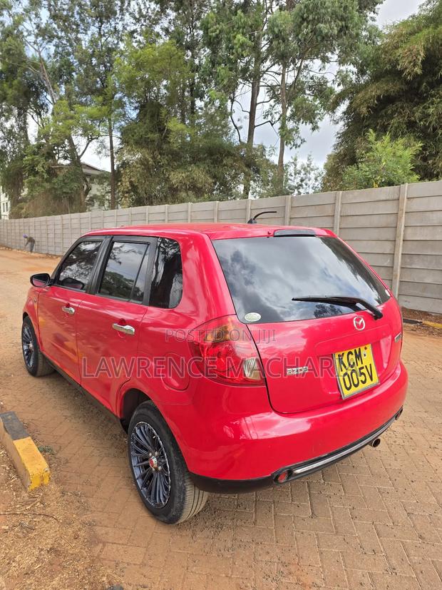 Mazda Verisa 2009 Red