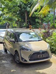 Toyota Sienta 1.5 Hybrid FWD (6-seater) 2018 Yellow for sale