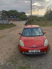 Mazda Verisa 2012 Red for sale