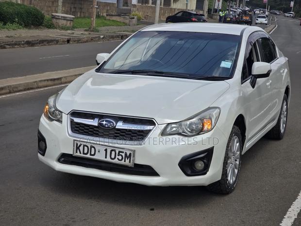 Subaru Impreza 2.0i PZEV 4dr Sedan AWD (2.0L 4cyl CVT) 2014 White