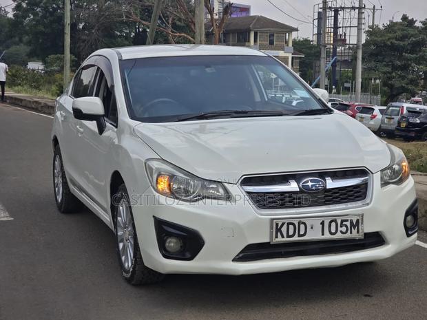 Subaru Impreza 2.0i PZEV 4dr Sedan AWD (2.0L 4cyl CVT) 2014 White