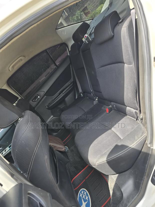 Subaru Impreza 2.0i PZEV 4dr Sedan AWD (2.0L 4cyl CVT) 2014 White