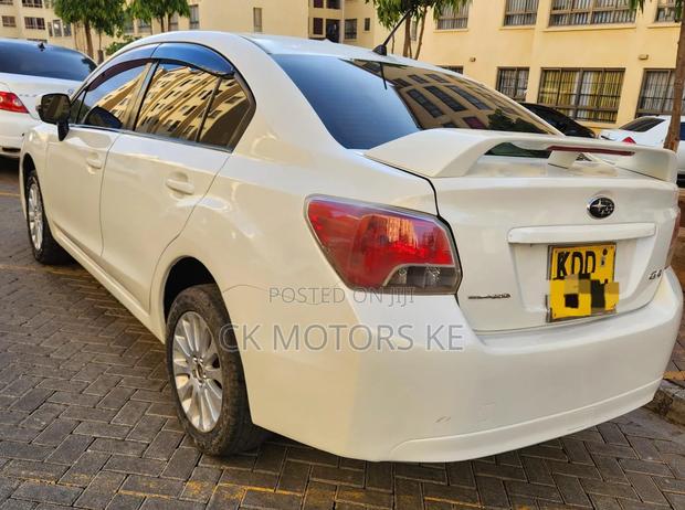 Subaru Impreza 2.0i Premium PZEV 4dr Sedan AWD (2.0L 4cyl 5M) 2014