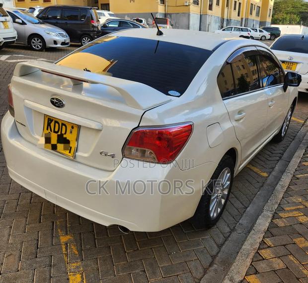 Subaru Impreza 2.0i Premium PZEV 4dr Sedan AWD (2.0L 4cyl 5M) 2014