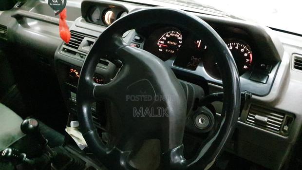 Mitsubishi Pajero Junior 1997 Maroon
