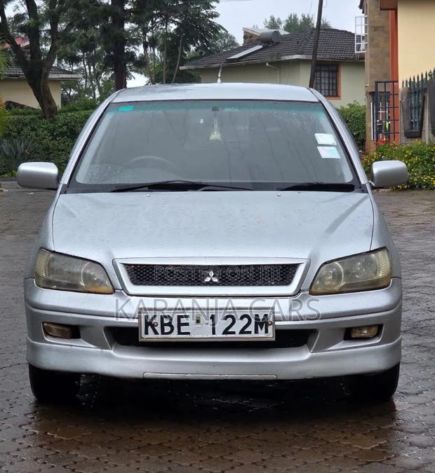 Mitsubishi Lancer Cedia OZ Rally 2004 Silver