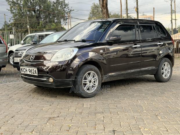 Mazda Verisa 2009 Brown