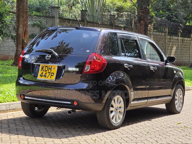 Mazda Verisa 2015
