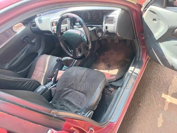 Toyota Corolla 1998 Maroon