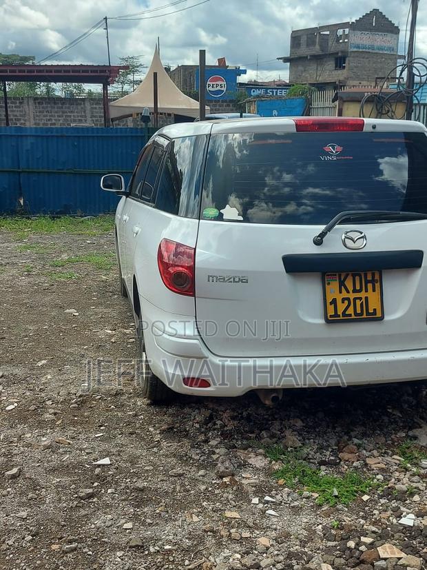 Mazda Familia 2015 White