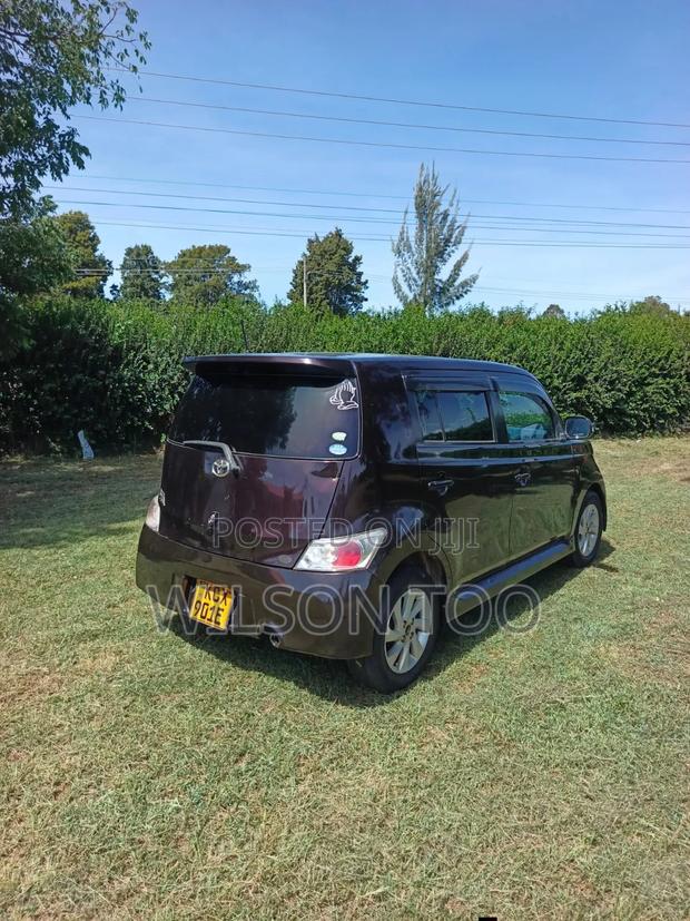Toyota bB 2012 Red
