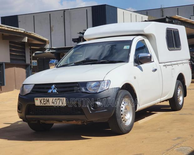 Mitsubishi L200 2009 White