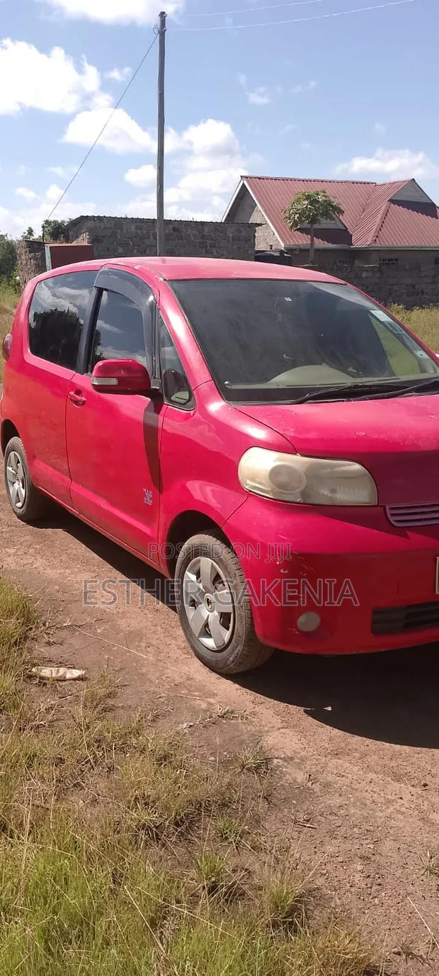 Toyota Porte 2009 Red