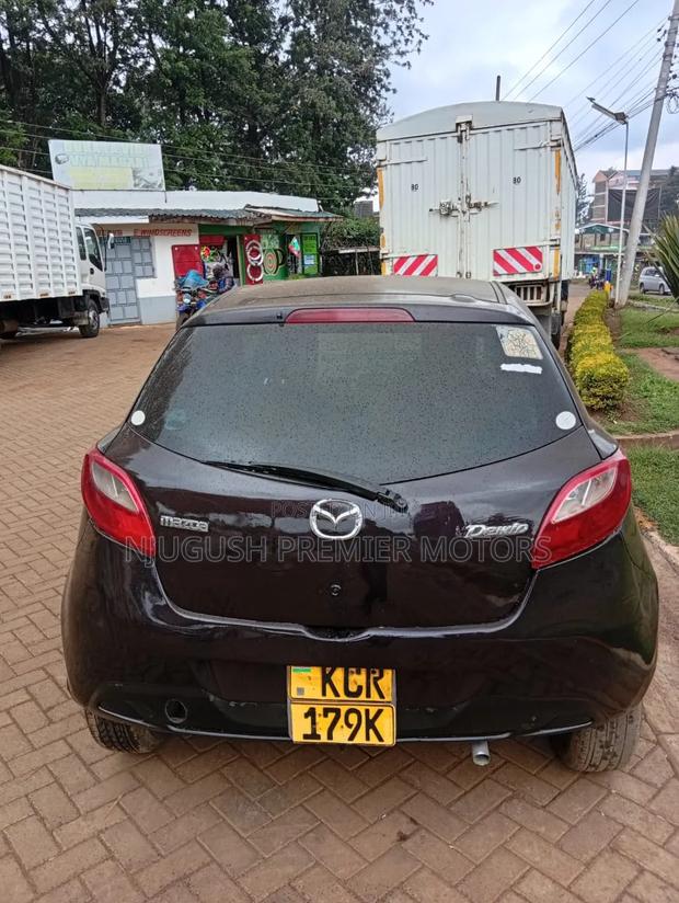 Mazda Demio 2011 Brown