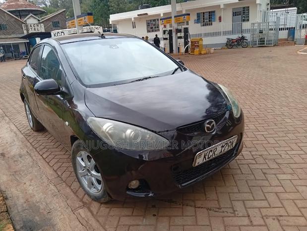 Mazda Demio 2011 Brown