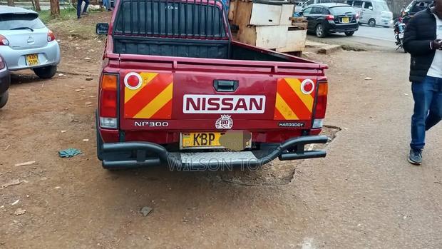 Nissan Hardbody 2014 Maroon