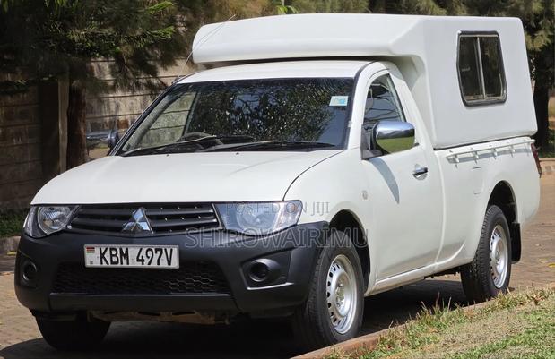 Mitsubishi L200 2009 Ivory