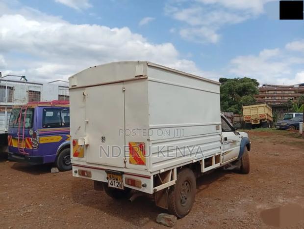 Tata E220 2013 White