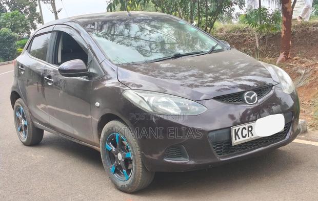 Mazda Demio 2011 Brown