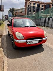 Toyota Duet 1999 Red for sale