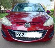 Mazda Demio 2010 Maroon for sale