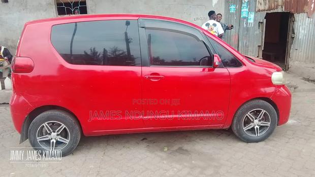 Toyota Porte 2011 Red