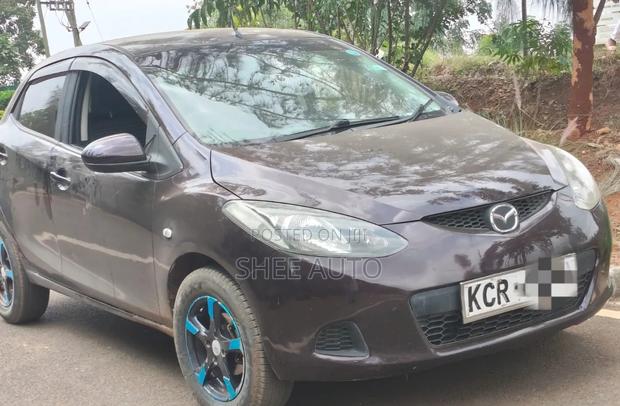 Mazda Demio 2011 Brown