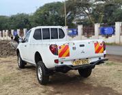 Mitsubishi L200 2010 White for sale