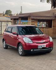 Mazda Verisa 2009 Red for sale