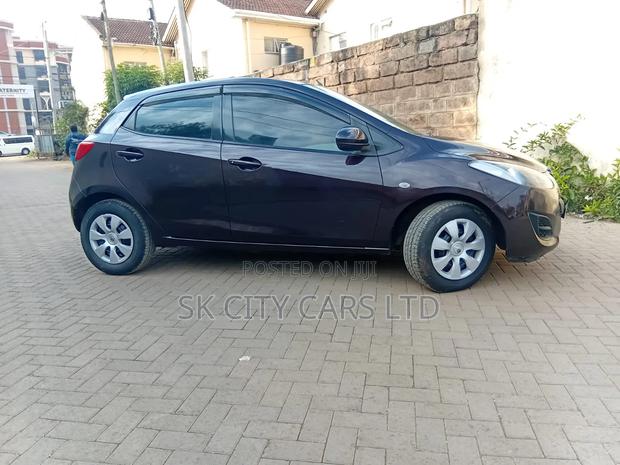 Mazda Demio 2012 Brown