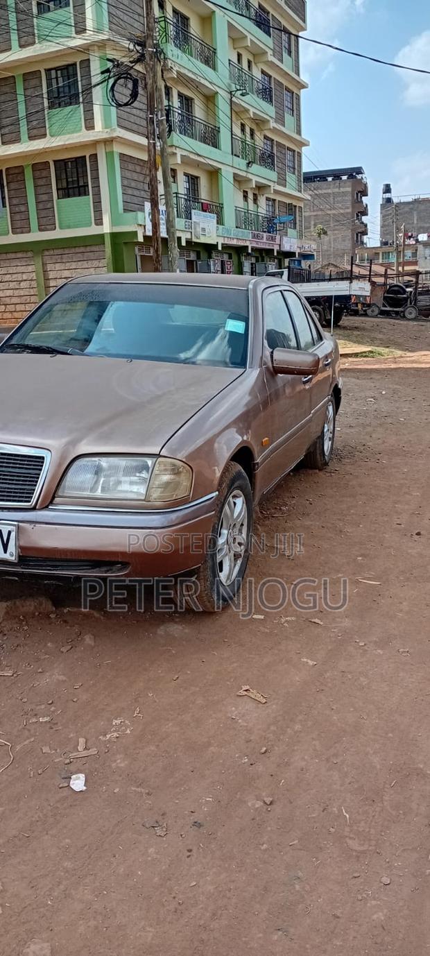 Mercedes-Benz 220 1998 Brown