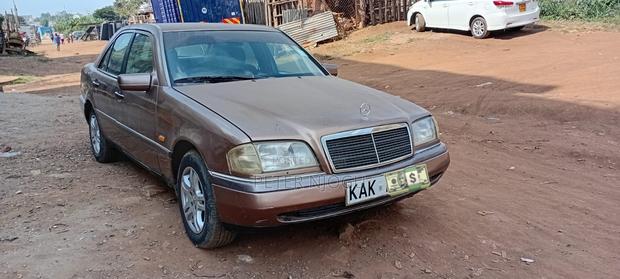 Mercedes-Benz 220 1998 Brown