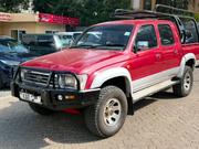 Toyota Hilux 2023 Maroon for sale