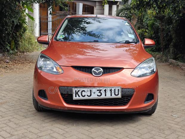 Mazda Demio 2009 Orange