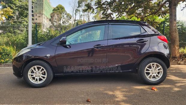Mazda Demio 2009 Brown