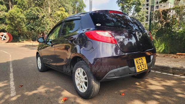 Mazda Demio 2009 Brown