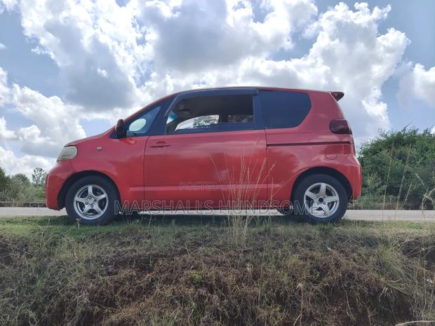 Toyota Porte 2010 Red